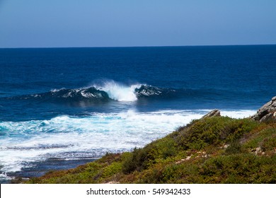 Ocean Waves rolling over to the Rocks