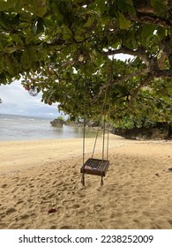 The ocean waves and the swing