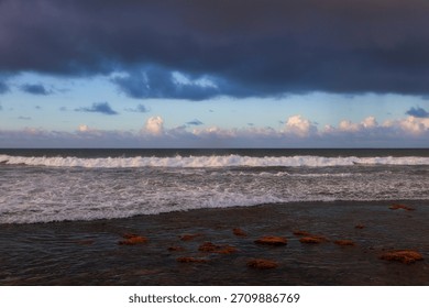 Ocean Waves Under a Dramatic Cloudy Sky