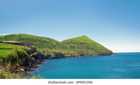 Oceanic Coast Of Azorean Island Of Terceira, Portugal, With Monte Brasil Mountain Which Forms A Peninsula.