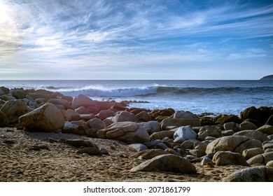 oceanscape of a rocky shore under daylight