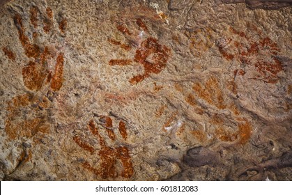 Ochre Hands, Red, Orange, Yellow Hand Prints On Rock, Aboriginal Art In Queensland, Australia.