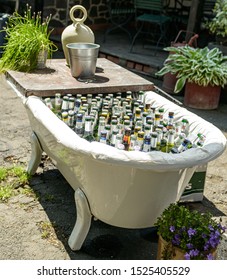 Ochtendung Germany 25.05.2019 Many Bottled Craft Beers On Ice In An Open Bathtup For A Party Setting