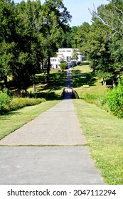 Ocmulgee Mounds National Historical Park In Macon, Georgia, Preserves  Earthworks Built Before 1000 CE By The South Appalachian Mississippian Culture. Walking Path And Bridge To The Visitor Center.