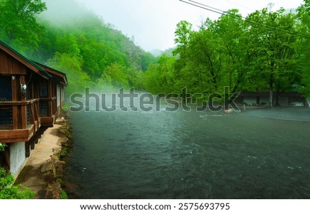 Ocoee River  flows through the southern Appalachian Mountains  and  is known for its  whitewater rapids, appealing to kayakers and rafting enthusiasts.