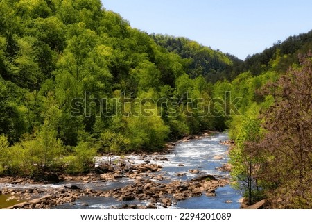 Ocoee River is one of the nation's top Whitewater rafting locations. in late spring and summer through the Ocoee Gorge and was host to the 1996 Olympic Whitewatr competition.  