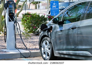 Ocotillo, Chandler, Arizona - August 08 2022: Intel Factory And Office Workers Charging Their EV Cars At A Charging Station At An Employee Parking Spot. Intel Offers Chargepoint Charging To Employees.