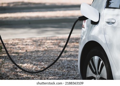 Ocotillo, Chandler, Arizona - August 08 2022: Intel Factory And Office Workers Charging Their EV Cars At A Charging Station At An Employee Parking Spot. Intel Offers Chargepoint Charging To Employees.