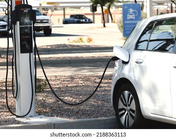 Ocotillo, Chandler, Arizona - August 08 2022: Intel Factory And Office Workers Charging Their EV Cars At A Charging Station At An Employee Parking Spot. Intel Offers Chargepoint Charging To Employees.