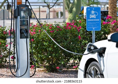 Ocotillo, Chandler, Arizona - August 08 2022: Intel Factory And Office Workers Charging Their EV Cars At A Charging Station At An Employee Parking Spot. Intel Offers Chargepoint Charging To Employees.