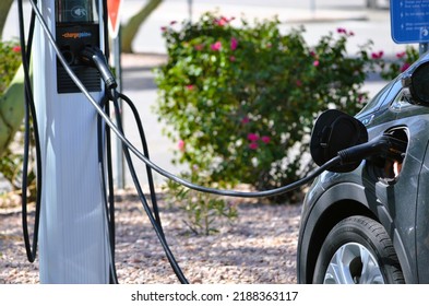 Ocotillo, Chandler, Arizona - August 08 2022: Intel Factory And Office Workers Charging Their EV Cars At A Charging Station At An Employee Parking Spot. Intel Offers Chargepoint Charging To Employees.