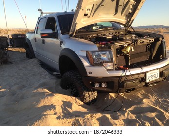 Ocotillo Wells, CA USA - Circa November 2016: Ford F-150 Raptor Truck Stuck In Desert Sand Getting Ready For Self Rescue With A Winch