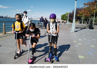 Oct 03, 2020 New Yorkers enjoying along the Hudson River Park after the lockdown from Covid-19, New York City, USA.