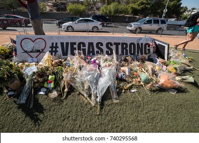 OCT 13 2017 LAS VEGAS NV: #Vegas Strong banner message, flowers and gifts at the memorial park by the Mandalay Bay on the Vegas Strip to remember victims killed in the Las Vegas attack shooting