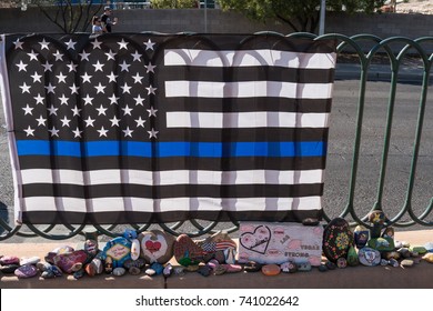 OCT 13 2017 - LAS VEGAS, NV: A law enforcement police flag to remember victims of the Las Vegas Shooting victims on the Las Vegas Strip Near the Mandalay Bay, during Route 91 Harvest Music Festival
