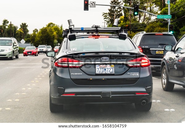 Oct 16, 2019 Palo Alto / CA / USA - Ford\
vehicle equipped with an autonomous driving system, performing\
tests on the streets of Silicon\
Valley
