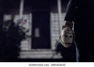 OCT 25 2020: Halloween Slasher Michael Myers Holding The Boogeyman Mask  - Neca Action Figure