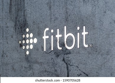 Oct 26, 2019 San Francisco / CA / USA - Fitbit Logo At Their Headquarters; Fitbit, Inc. Is An American Company That Produces Wireless-enabled Wearable Technology Devices For Activity Tracking