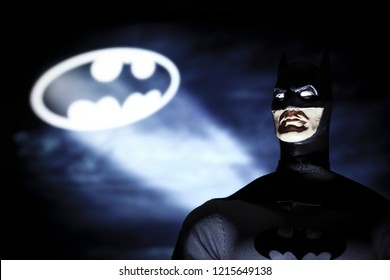 OCT 27 2018:  Portrait of Batman with the Bat Signal, Gotham City - DC Comics - Mego action figure
