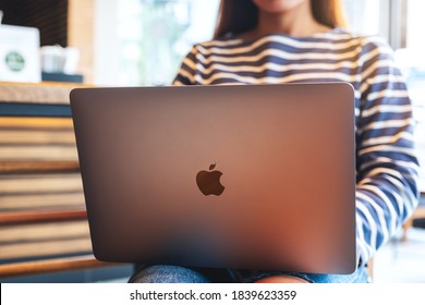 Oct 3rd 2020 : A woman using and working on Apple MacBook Pro laptop computer , Chiang mai Thailand