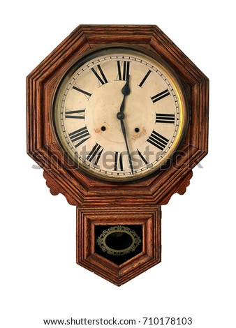 Octagonal wooden wall clock; vintage pendulum clock, isolated on white ground
