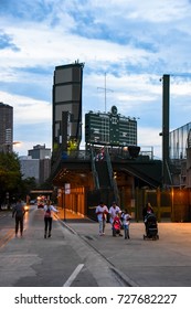 October 10, 2016 - A Family Walking Around Wrigley Field, Wrigleyville, Chicago, Illinois