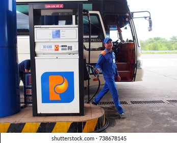 October 15, 2017 Inside Gasoline Station And Services In VIETNAM Under The National Brand Picture Shows A Gas Station Worker At Filling A Site Seeing Tourist Bus