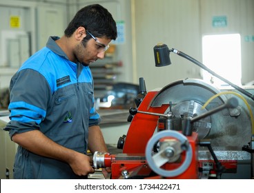 OCTOBER 15,2014-DOHA,QATAR:Qatar Technical School Student Training Mechanical Engineering Service Industrial Oil And Gas Equipment As Part Of A Study