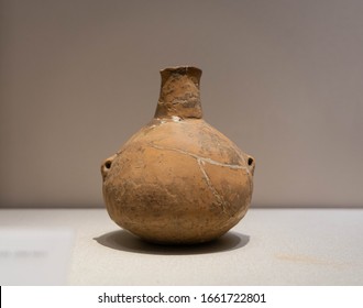 October 16, 2020, Handan, China : Red Pottery Ewer With Small Mouth, Double Handles, Long Neck And Swelling Belly. Ancient China, Early Or Middle Neolithic. Unearthed From Wuan, Hebei Province.