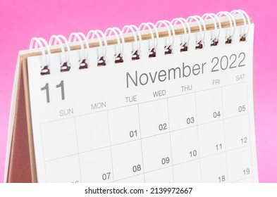 The October 2022 Desk Calendar On Pink Background With Empty Space.