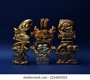 October 2022, Istanbul, Turkiye: Gold Figurines Of Spongebob Squarepants By Burger King Meal Toys.