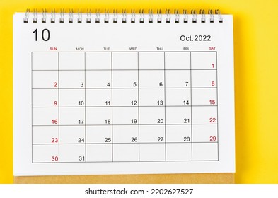 October 2022 Monthly desk calendar for 2022 year on yellow background. - Shutterstock ID 2202627527