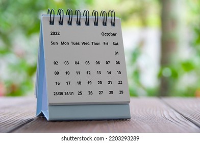 October 2022 Table Calendar With Blurred Nature Background. Calender Concept.