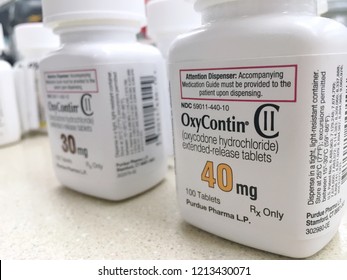 October 21, 2018: Ogden Utah USA- OxyContin bottles sit on counter which is a famous drug in the current news for causing overdose and addiction