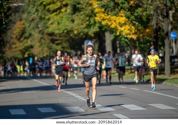 October 3, 2021 Bila\
Tserkva, Ukraine Marathon race, leader athlete runner running city\
Marathon competition