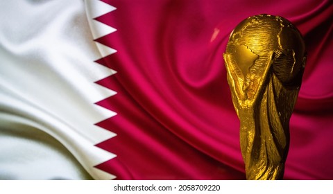 October 6, 2021 Doha, Qatar. FIFA World Cup Cup against the background of the Qatar flag.