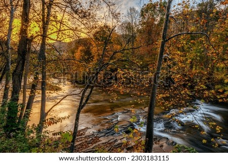 October sunrise at Cherry Falls on the Elk River in the unincorporated community of Cherry Falls outside Webster Springs, West Virginia, USA