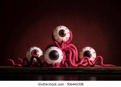 Octopus Monster on dark red background