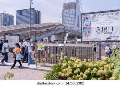 Odaiba, Japan- August 10, 2019: People Walk Out The Entrance Of The Comiket Event In Odaiba.