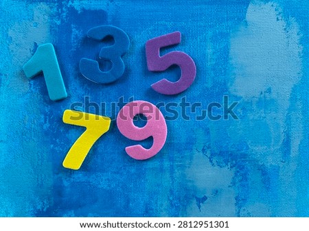 Odd Numbers Learning Concept For Children - representing early math learning, preschool education, numeracy, odd numbers, counting practice, children’s activities, classroom materials, and playful learning with copy space.