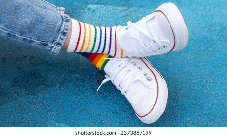 Odd Socks day. Down syndrome awareness concept.  a child in sneakers and mismatched socks 