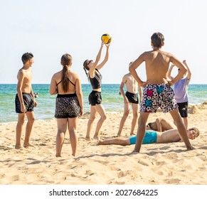 Odesa Rgn., Ukraine, August 05, 2021: Teens Playing Volleyball On The Sea Beach