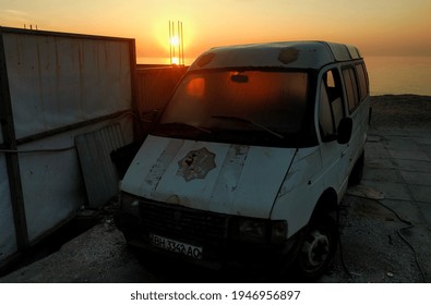 ODESA, UKRAINE - 31 MARCH, 2020: A White Van At Beach At Sunrise