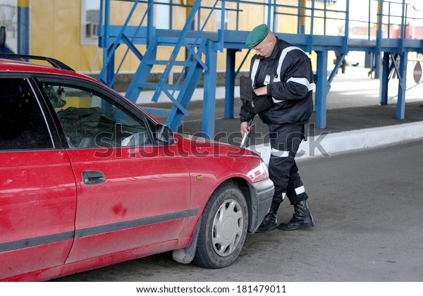 ODESSA - APRIL 23: Customs Border\
checkpoint Ukraine - Moldova . Inspection of citizens and the car\
crossing the border , April 23, 2008 in Odessa,\
Ukraine