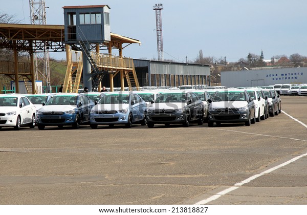 ODESSA - MARCH 15: maritime customs border\
crossing point of Ukraine. Large batch of new cars peresechekla\
border discharged from  sea ferry Odessa - Varna, Bulgaria, 15\
March 2013 in Odessa,\
Ukraine