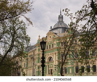 Odessa, Ukraine - 04 24 21: Russov Tenement House Architecture Monument Landmark. Classic Green Building Facade In Front Of Grey Sky