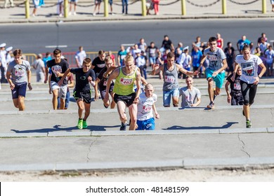 ODESSA, UKRAINE -10 September 2016: Athletes Of All Ages, Fitness Children, Youth, Adults And Elderly Run By Potemkin Stairs In Physical Sports Holiday, Day Of City. Competition Running Up Stairs