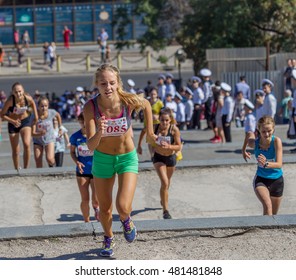 ODESSA, UKRAINE -10 September 2016: Athletes Of All Ages, Fitness Children, Youth, Adults And Elderly Run By Potemkin Stairs In Physical Sports Holiday, Day Of City. Competition Running Up Stairs