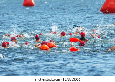 ODESSA, UKRAINE - 8.09.2018: OceanMan We Open Open Water Swimming Competition For Children. Swimmers Children From Shore Get Into Water And Big Race In Swimming On Open Water Of Sea. Sports Lifestyle