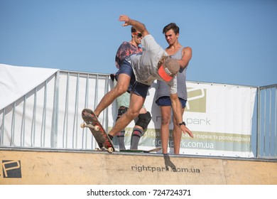 Odessa, Ukraine August 26, 2018: Athletes compete in skateboard competition. Skateboarder on ramp. Outdoor skate contest. extreme sport competition skateboarders. Young skater jump high on mini ramp. - Shutterstock ID 724724371